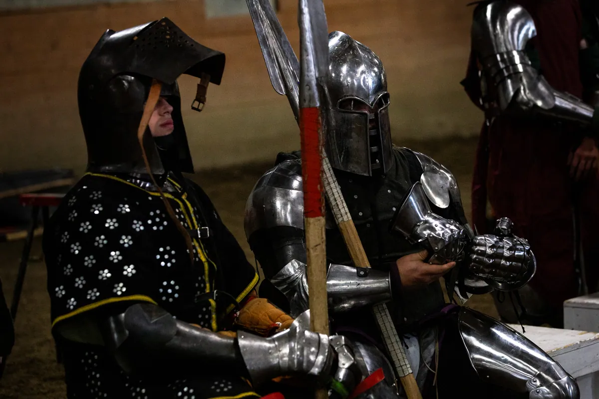 Fighters with polearms waiting at the rail
